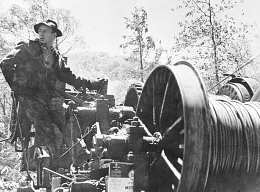 Roscoe Woods operating an overhead skidder near TN/NC border, for Brooks Lumber Company.