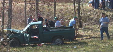 This small truck was knocked off the road into a tree, while trying to pull onto Reagan Valley Road.